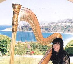 Pamela Brown with her harp at a special event.